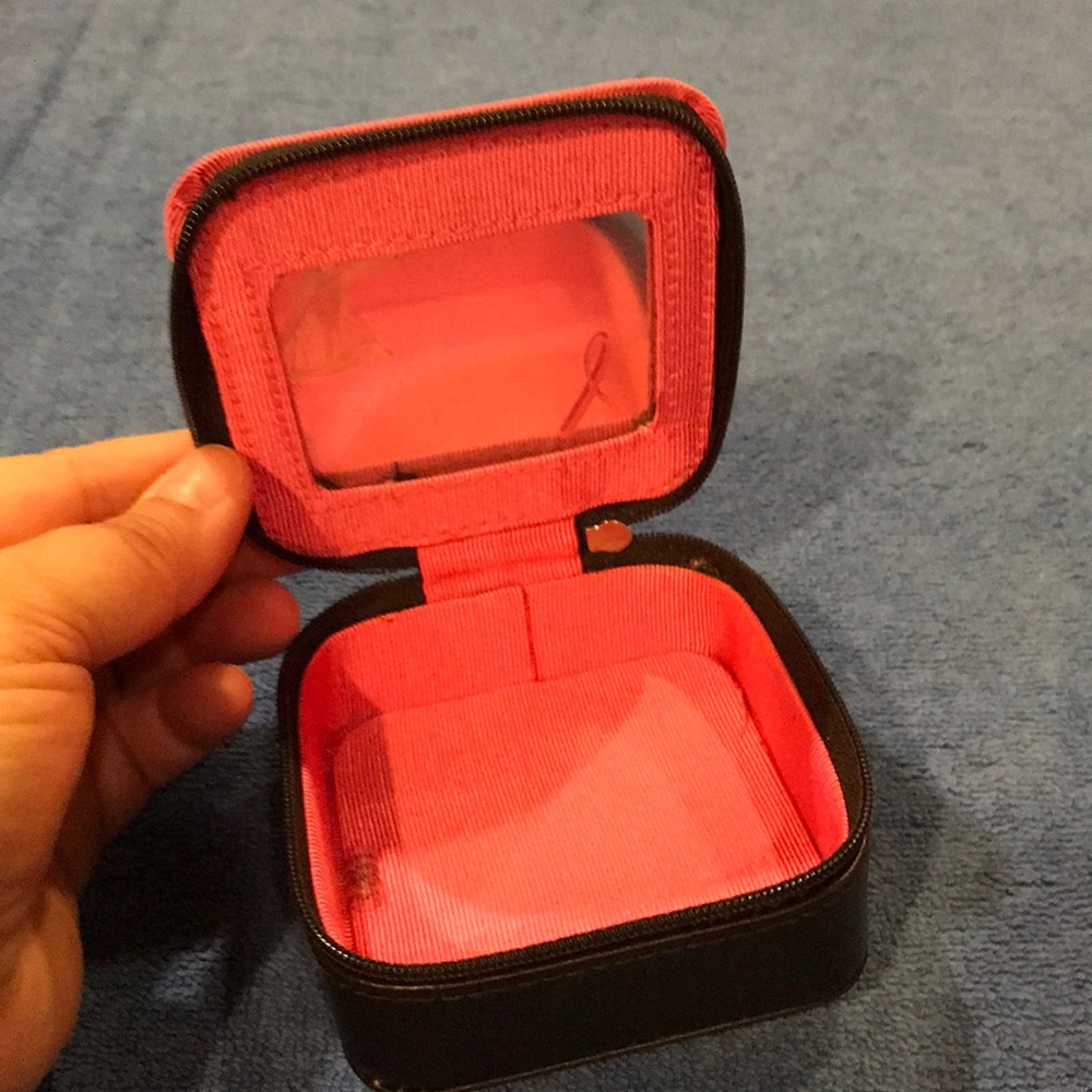 Small Zippered faux leather travel case